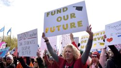 FILE PHOTO: Teachers rally outside the state Capitol on the second day of a teacher walkout to demand higher pay and more funding for education in Oklahoma City, Oklahoma, U.S., April 3, 2018. REUTERS/Nick Oxford/File Photo