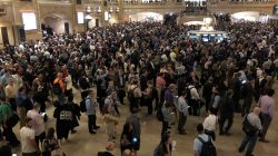 Commuters wait as service was temporarily suspended on all Metro North lines at Grand Central Terminal due to storms in Manhattan, New York, May 15, 2018. REUTERS/Herbert Lash