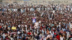 A supporter of the Pashtun Tahaffuz Movement (PTM) holds a placard, with a photo of a missing person, at a rally in response to alleged human rights violations by security forces, in Karachi, Pakistan May 13, 2018. Picture taken May 13, 2018. REUTERS/Akhtar Soomro