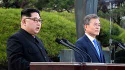 FILE PHOTO: North Korean leader Kim Jong Un and South Korean President Moon Jae-in deliver a statement at the truce village of Panmunjom inside the demilitarized zone separating the two Koreas, South Korea, April 27, 2018. Korea Summit Press Pool/Pool via Reuters