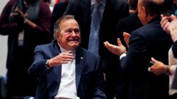 FILE PHOTO - Former United States President George H. W. Bush is brought into the auditorium where his son Former United States President George W. Bush speaks about his new book titled "41: A Portrait of My Father" at the George Bush Presidential Library Center in College Station, Texas November 11, 2014. REUTERS/Bob Daemmrich/Pool/File Photo