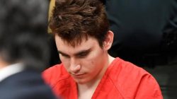 FILE PHOTO: Nikolas Cruz sits next to his attorneys appointed by the Broward Public Defender’s Office as a judge determines if he can afford his own lawyer, in Broward Courthouse in Fort Lauderdale, Florida, U.S., April 11, 2018. Taimy Alvarez/Pool via REUTERS/File Photo