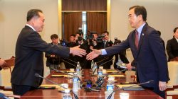 South Korean Unification Minister Cho Myoung-gyon shakes hands with his North Korean counterpart Ri Son Gwon during their meeting at the truce village of Panmunjom, South Korea, June 1, 2018. Yonhap via REUTERS