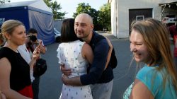 Russian dissident journalist Arkady Babchenko (C) greets acquaintances as he visits the office of the Crimean Tatar channel ATR in Kiev, Ukraine May 31, 2018. REUTERS/Valentyn Ogirenko