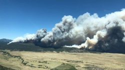 FILE PHOTO: Smoke is seen from a fire in this aerial shot above Cimarron, New Mexico, U.S., June 1, 2018 in this picture obtained from social media on June 2, 2018. Justin Hawkins/via REUTERS