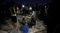 People react at the site of a car bomb attack in Sadr City district of Baghdad, Iraq June 6, 2018. REUTERS/Wissm al-Okili