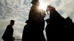 FILE PHOTO: Graduating students arrive for Commencement Exercises at Boston College in Boston, Massachusetts, U.S. on May 20, 2013. REUTERS/Brian Snyder/File Phot