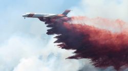 A plane drops fire-retardant chemicals on the 416 Fire near Durango, California, U.S. in this June 9, 2018 handout photo. La Plata County/Handout via REUTERS
