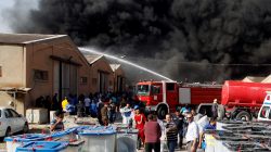 Smoke rises from a storage site in Baghdad, housing ballot boxes from Iraq's May parliamentary election, Iraq June 10, 2018. REUTERS/Khalid al-Mousily