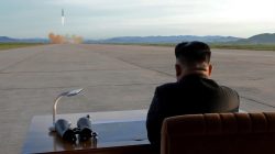 FILE PHOTO: North Korean leader Kim Jong Un watches the launch of a Hwasong-12 missile in this undated photo released by North Korea's Korean Central News Agency (KCNA) on September 16, 2017. KCNA via REUTERS