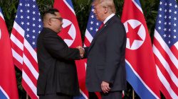 U.S. President Donald Trump shakes hands with North Korean leader Kim Jong Un at the Capella Hotel on Sentosa island in Singapore June 12, 2018. REUTERS/Jonathan Ernst