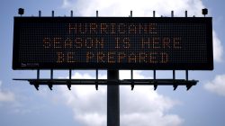 A traffic sign warns of hurricane season in Stowell, Texas, U.S., June 12, 2018. Picture taken June 12, 2018. REUTERS/Jonathan Bachman