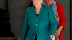 German Chancellor Angela Merkel walks at the fraction level of the German lower house of parliament Bundestag in Berlin, Germany June 14, 2018. REUTERS/Michele Tantussi