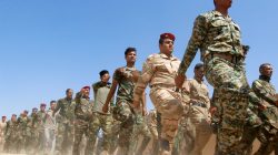 FILE PHOTO: Popular Mobilisation Forces (PMF) march during a military parade in Daquq, nearby Kirkuk, Iraq August 5, 2017. REUTERS/Ako Rasheed/File Photo