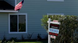 FILE PHOTO: A "For Sale" sign is seen outside a home in Cardiff, California, U.S. on February 22, 2016. REUTERS/Mike Blake/File Photo