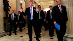 U.S. President Donald Trump speaks briefly to the news media after leaving a closed House Republican Conference meeting with House Majority Leader Kevin McCarthy (R-CA) at the U.S. Capitol in Washington, D.C., U.S., June 19, 2018. REUTERS/Leah Millis