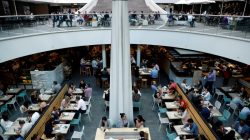 FILE PHOTO: Office workers take their lunch at a food court in Sydney, Australia May 4, 2018. REUTERS/Edgar Su/File Photo