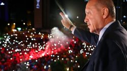 Turkish President Tayyip Erdogan greets his supporters from the balcony of his ruling AK Party headquarters in Ankara, Turkey, early June 25, 2018. Kayhan Ozer/Presidential Palace/Handout via REUTERS