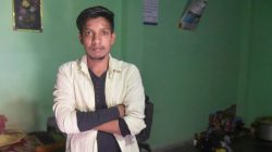Satish Bhaykre, 21, who was beaten by a mob due to a fake WhatsApp text, poses inside his house on the outskirts of Nagpur, India, June 23, 2018. Picture taken June 23, 2018. REUTERS/Stringer