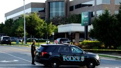 A police car blocks the road in front of the Capital Gazette a day after a gunman opened fire at the newspaper, killing five people and injuring several others in Annapolis, Maryland, U.S., June 29, 2018. REUTERS/Joshua Roberts