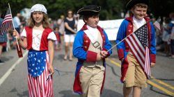 Children in costumes march down Main Street during the annual Fourth of July parade in Barnstable Village on Cape Cod, Massachusetts, U.S., July 4, 2018. REUTERS/Mike Segar