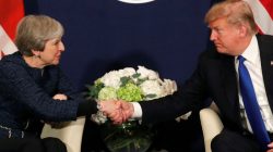 FILE PHOTO: U.S. President Donald Trump shake hands with Britain's Prime Minister Theresa May during the World Economic Forum (WEF) annual meeting in Davos, Switzerland, January 25, 2018. REUTERS/Carlos Barria/File Photo
