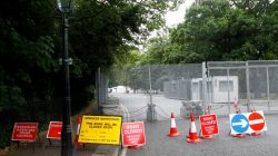 Temporary signs indicate road closures around the U.S. ambassador's residence, where special fences have been erected prior to the U.S. presidential visit at the end of the week, in Regent's Park in London, Britain, July 10, 2018. REUTERS/Henry Nicholls