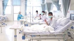 A screen grab shows boys rescued from the Thai cave wearing mask and resting in a hospital in Chiang Rai, Thailand from a July 11, 2018 handout video. Government Public Relations Department (PRD) and Government Spokesman Bureau/Handout via REUTERS TV