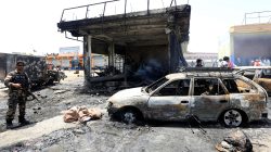 Afghan security forces inspect the site of a suicide attack in Jalalabad city, Afghanistan July 10, 2018. REUTERS/Parwiz