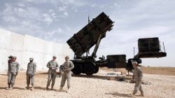 FILE PHOTO: U.S. soldiers stand beside a U.S. Patriot missile system at a Turkish military base in Gaziantep, southeastern Turkey, October 10, 2014.. REUTERS/Osman Orsal