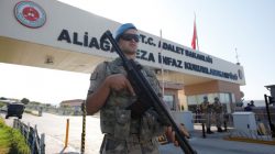 A Turkish soldier stands guard in front of the Aliaga Prison and Courthouse complex in Izmir, Turkey July 18, 2018. REUTERS/Kemal Aslan