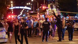 People leave an area taped off by the police near the scene of a mass shooting in Toronto, Canada, July 22, 2018. REUTERS/Chris H