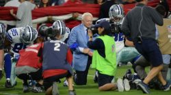 FILE PHOTO: Dallas Cowboys owner Jerry Jones kneels with players prior to the national anthem prior to the game against the Arizona Cardinals at University of Phoenix Stadium in Glendale, Arizona, U.S., September 25, 2017. Mandatory Credit: Joe Camporeale-USA TODAY Sports/File Photo