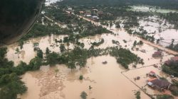 Aerial view shows the flooded area after a dam collapsed in Attapeu province, Laos July 25, 2018 in this image obtained from social media. MIME PHOUMSAVANH/via REUTERS