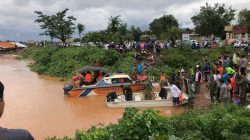 Rescuers work at a flooded site after a hydropower dam collapse in Attapeu Province, Laos July 24, 2018 in this image obtained from social media. Picture taken July 24, 2018. Mime Phoumsavanh via REUTERS