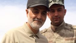 FILE PHOTO: Iranian Revolutionary Guard Commander Qassem Soleimani (L) stands at the frontline during offensive operations against Islamic State militants in the town of Tal Ksaiba in Salahuddin province March 8, 2015. REUTERS/Stringer