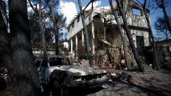 Aristides Katsaros' burnt house is seen following a wildfire in the village of Mati, near Athens, Greece, July 27, 2018. REUTERS/Costas Baltas