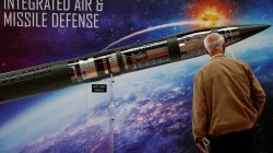FILE PHOTO: A man looks at a Patriot Advanced Capability (PAC-3) Missile Segment Enhancement (MSE) model by Lockheed Martin at an international military fair in Kielce, Poland September 7, 2017. REUTERS/Kacper Pempel/File Photo