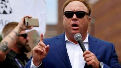 FILE PHOTO: Alex Jones from Infowars.com speaks during a rally in support of Republican presidential candidate Donald Trump near the Republican National Convention in Cleveland, Ohio, U.S., July 18, 2016. REUTERS/Lucas Jackson/File Photo
