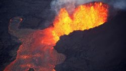 FILE PHOTO: Lava erupts in Leilani Estates during ongoing eruptions of the Kilauea Volcano in Hawaii, U.S., June 5, 2018. REUTERS/Terray Sylvester
