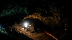 FILE PHOTO: Rescue workers at the Tham Luang cave complex in Thailand on, July 10, 2018, the day 12 boys were rescued after nine days trapped in the caves. REUTERS/Soe Zeya Tun/File Photo
