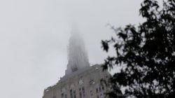 The top of the Empire State Building is covered in fog during a rainy day in Manhattan, New York, U.S., August 13, 2018. REUTERS/Shannon Stapleton