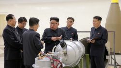 FILE PHOTO: North Korean leader Kim Jong Un provides guidance with Ri Hong Sop (3rd L) and Hong Sung Mu (L) on a nuclear weapons program in this undated photo released by North Korea's Korean Central News Agency (KCNA) in Pyongyang September 3, 2017. KCNA via REUTERS/File Photo