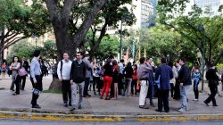 People gather in the street after an earthquake in Caracas, Venezuela August 21, 2018. REUTERS/Marco Bello