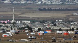 FILE PHOTO: A general view shows refugee tents erected at the Syrian side of the Israeli-Syrian border as it is seen from the Israeli-occupied Golan Heights, Israel July 19, 2018. REUTERS/Amir Cohen -/File Photo