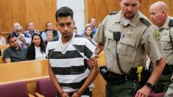 Cristhian Rivera, 24, accused of killing University of Iowa student Mollie Tibbetts, is led from the courtroom after making his initial appearance on a charge of first-degree murder during at the Poweshiek County Courthouse in Montezuma, Iowa, U.S., August 22, 2018. Jim Slosiarek/The Gazette/Pool via REUTERS