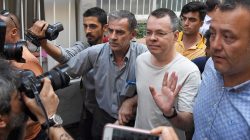 FILE PHOTO: U.S. pastor Andrew Brunson reacts as he arrives at his home after being released from the prison in Izmir, Turkey July 25, 2018. Demiroren News Agency/DHA via REUTERS/File Photo