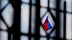 The Russian flag flies over the Embassy of Russia in Washington, U.S., August 6, 2018. REUTERS/Brian Snyder