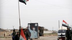 FILE PHOTO: Syrian forces loyal to President Bashar al-Assad hold a checkpoint in Aleppo, Syria February 10, 2018. REUTERS/Omar Sanadiki/File Photo