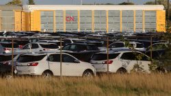 FILE PHOTO: Chevrolet Equinox SUVs are parked awaiting shipment by CN Rail next to the General Motors Co (GM) CAMI assembly plant in Ingersoll, Ontario, Canada October 13, 2017. REUTERS/Chris Helgren/File Photo